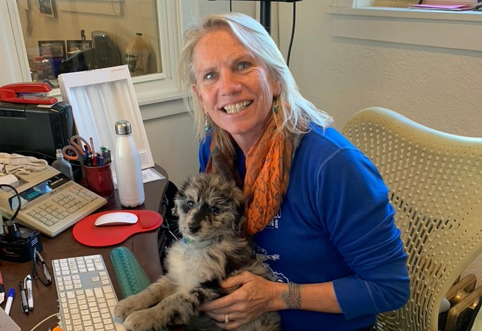 Lori & baby Ester at work cropped