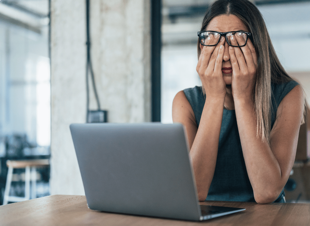 Tired Woman Rubbing Her Eyes