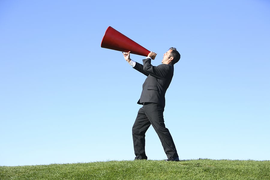 bigstock-Businessman-with-megaphone-14085428