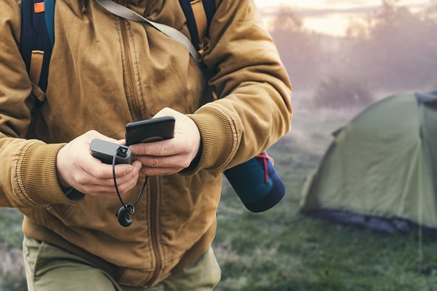 bigstock-Man-Holds-A-Smartphone-In-His--431605703